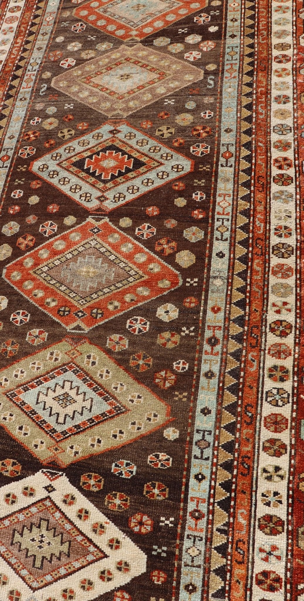 Long Persian Kurdish Runner with Medallion Design in Brown, Orange and Cream Antique Persian Kurdish long runner with tribal medallions, Keivan Woven Arts rug/SUS - 1908 - 115, country of origin / type: Iran or Kurdish, circa 1910. Long Persian Ku... - Keivan Woven ArtsSUS - 2012 - 660 - 14278Rug