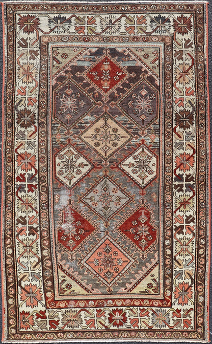 Beautiful Antique Persian Bakhitari Rug in Diamond Patten in Gray & Multi Colors. antique Bakhtiari rug in Geometric motifs and diamond design in the background. the background is composed of light and medium gray, red, green, yellow, salmon, cream... - Keivan Woven ArtsSUS - 2012 - 693 - 14282