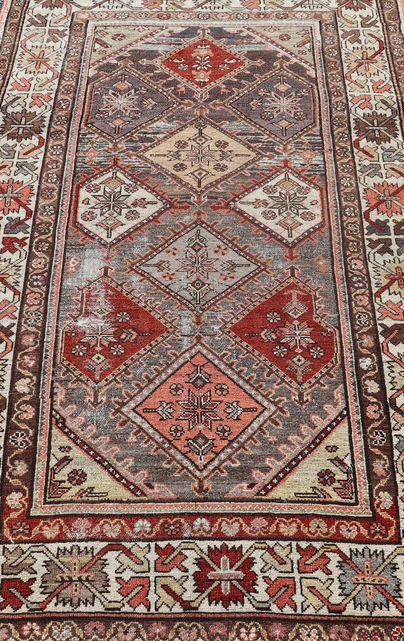 Beautiful Antique Persian Bakhitari Rug in Diamond Patten in Gray & Multi Colors. antique Bakhtiari rug in Geometric motifs and diamond design in the background. the background is composed of light and medium gray, red, green, yellow, salmon, cream... - Keivan Woven ArtsSUS - 2012 - 693 - 14282Rug
