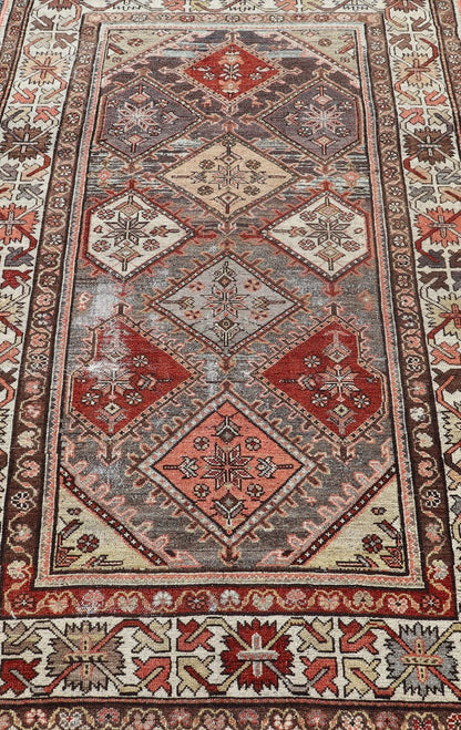 Beautiful Antique Persian Bakhitari Rug in Diamond Patten in Gray & Multi Colors. antique Bakhtiari rug in Geometric motifs and diamond design in the background. the background is composed of light and medium gray, red, green, yellow, salmon, cream... - Keivan Woven ArtsSUS - 2012 - 693 - 14282Rug