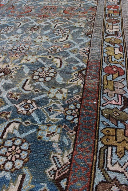 Early 20th Century Very Long Kurdish Runner with Dark/Light Blue, Red and Taupe kwarugs This Kurdish tribal rug was woven by Kurdish weavers in western Persia in the early 20th century. Often they used this repeating latch - hook design in the... - Keivan Woven ArtsSUS - 259 - 8421Rug