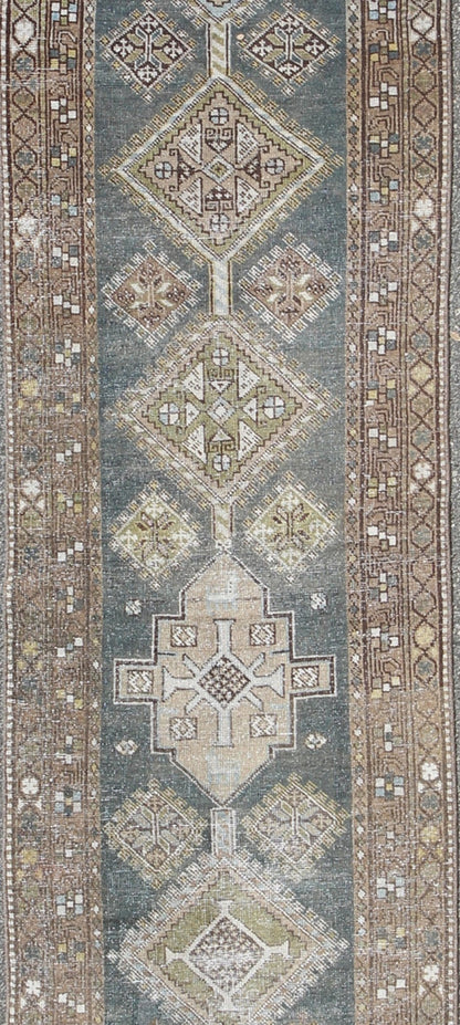 Heriz Antique Persian Rug with Multi - Layered Geometric Medallions in Blue, Brown, rug sus - 4702, country of origin / type: Iran / Heriz Serapi, circa 1900 This magnificent Heriz Serapi runner woven in the early 20th century bears an exquisite des... - Keivan Woven ArtsSUS - 4702 - 9132Rug