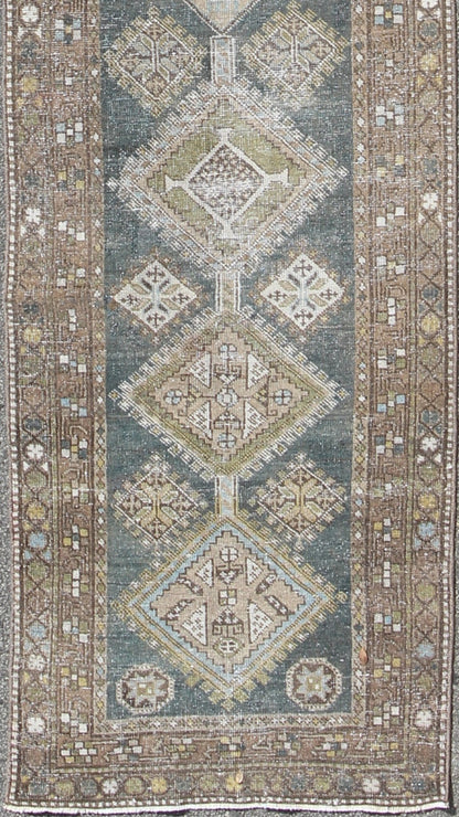 Heriz Antique Persian Rug with Multi - Layered Geometric Medallions in Blue, Brown, rug sus - 4702, country of origin / type: Iran / Heriz Serapi, circa 1900 This magnificent Heriz Serapi runner woven in the early 20th century bears an exquisite des... - Keivan Woven ArtsSUS - 4702 - 9132Rug