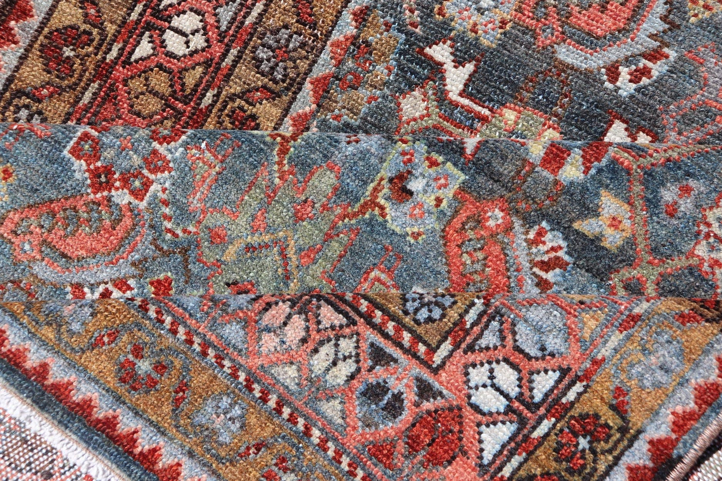 N.W. Persian Runner with Geometric Florals Set on a Deep Blue Field This Northwest Persian runner features a deep blue background flanked by multiple sand - colored and red borders. The elegant, all - over design in the field consists of a free - flow... - Keivan Woven ArtsSUS - 60 - 8395Rug