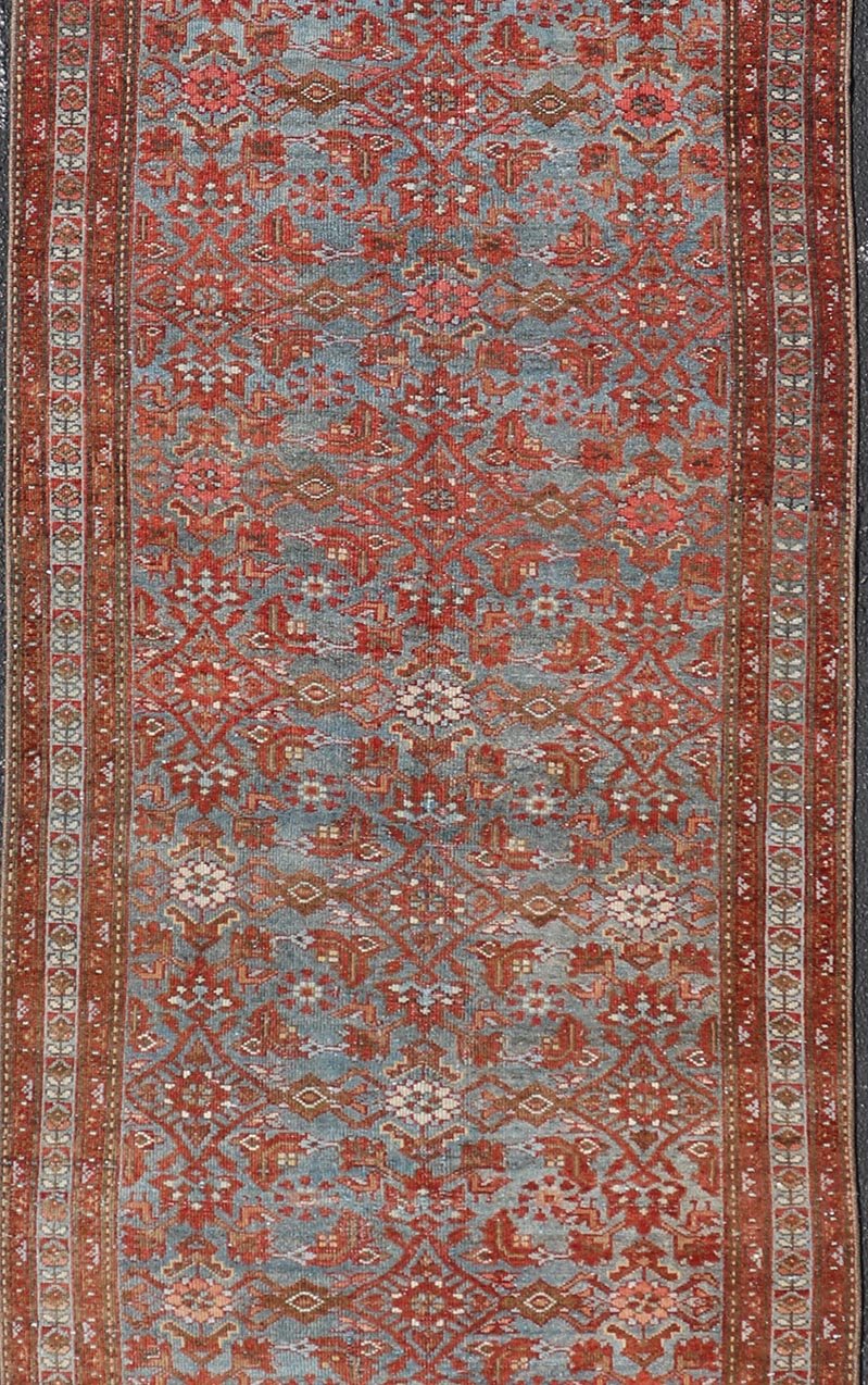 Persian Malayer Runner with Sub - Geometric Design in Blue, Red and Taupe This magnificent antique Persian Malayer carpet, of an impressive size, bears a beautiful, all - over sub - geometric design paired with a delightful palette of various shades o... - Keivan Woven ArtsSUS - 76 - 8401Rug