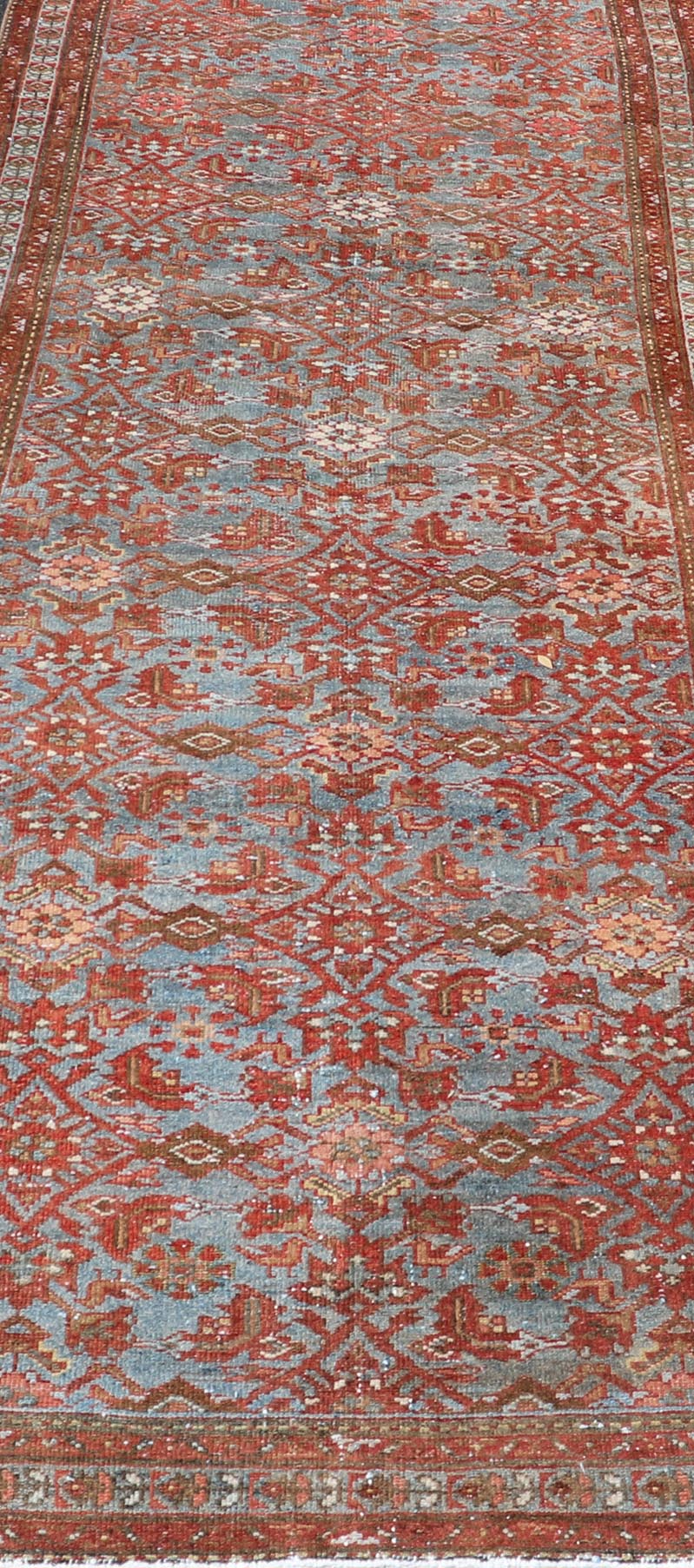 Persian Malayer Runner with Sub - Geometric Design in Blue, Red and Taupe This magnificent antique Persian Malayer carpet, of an impressive size, bears a beautiful, all - over sub - geometric design paired with a delightful palette of various shades o... - Keivan Woven ArtsSUS - 76 - 8401Rug
