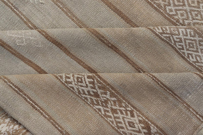 Vintage Turkish Kilim Rug with Subtle Earthy Tones and Intricate Geometric Patterns