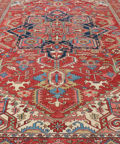 Antique Persian Serapi Carpet in Warm Red, Ivory, and Blue With Geometric Design. Keivan Woven Arts; rug TRA - 1010, country of origin / type: Iran / Serapi, circa 1900. Measures: 10'4 x 15'. This antique Persian Serapi carpet displays a wonderful... - Keivan Woven ArtsTRA - 1010 - 2567Rug