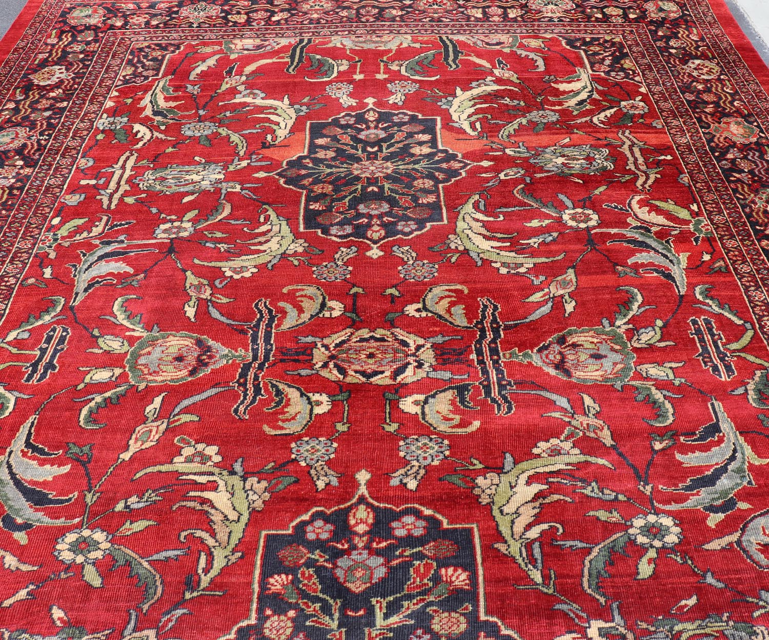 Antique Persian Ziegler Sultanabad Rug with Botanical Elements Set on Red Field. Keivan Woven Arts / rug TRA - 120701, country of origin / type: Iran / Ziegler Sultanabad, circa 1900. Antique Ziegler, Antique Sultanabad Measures: 12'3 x 18'3. Thi... - Keivan Woven ArtsTRA - 120701 - 3285Rug