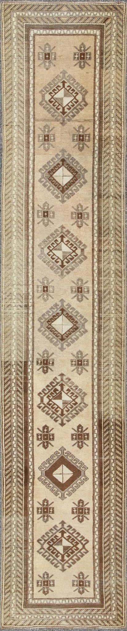 Earth - Toned Vintage Turkish Oushak Runner with Stacked Medallion Design. Light camel, brown, and taupe Oushak runner from Turkey with tribal geometric design, Keivan Woven Arts rug #TRA - 180401, country of origin / type: Turkey / Oushak, circa 1940. ... - Keivan Woven ArtsTRA - 180401 - 10217Rug