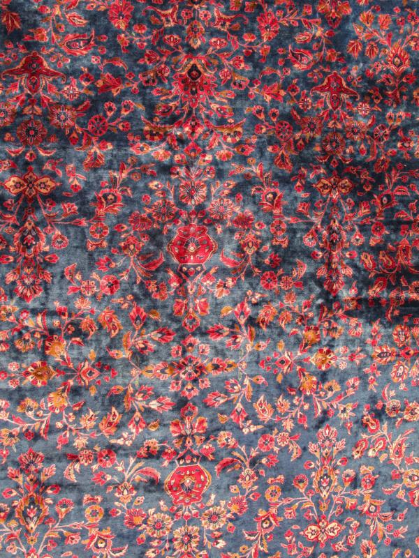 Antique Fine Manchester Kashan Rug from Iran with Silk Wool in Blue and Red Distinct colors that are similar yet starkly rendered flow alongside each other in this gorgeous antique rug. Bright red sets the attractive background for the largest b... - Keivan Woven ArtsTRA - 5082 - 345Rug