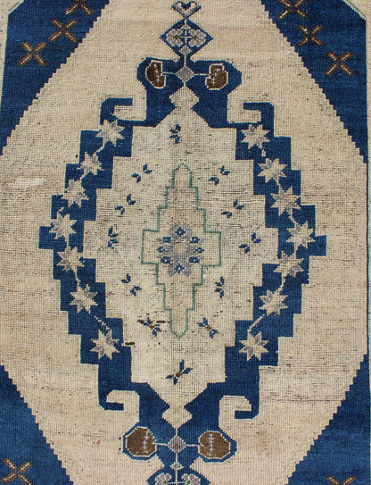 Keivan Woven Arts - Vintage Turkish Oushak Medallion Rug in Navy Blue, Ivory, Taupe and Brown, Tulu rugs, Moroccan Rugs, Vintage Tulu, Vintage Moroccan Measures: 4'4 x 7'6. This vintage Turkish Oushak carpet (circa mid - 20th century) feature... - Keivan Woven ArtsTU - 9305 - 1676Rug