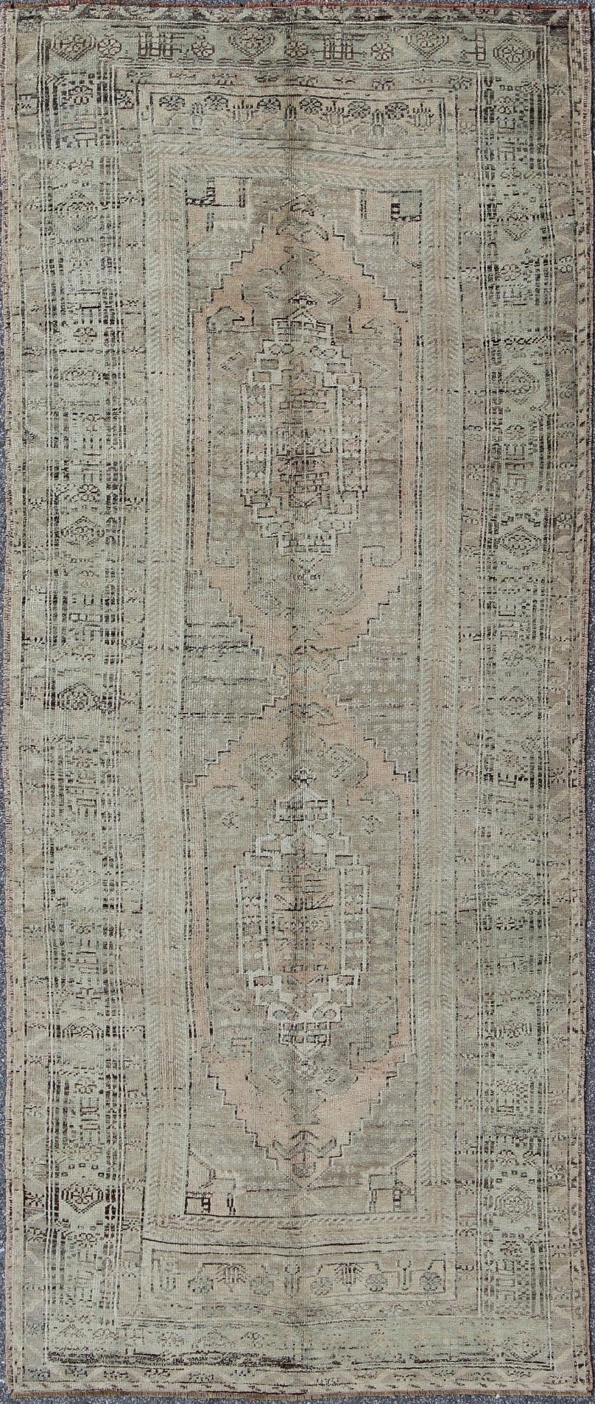 Muted Vintage Turkish Oushak Carpet with Dual - Medallion Design Turkish Oushak Carpet with Dual - Medallion Design rug/tu - alg - 136576 origin/ turkey This stunning vintage Turkish Oushak carpet features a Dual - medallion large - scale design... - Keivan Woven ArtsTU - ALG - 136576 - 4930Rug