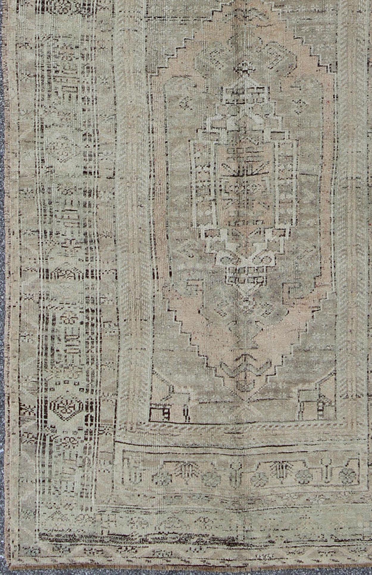 Muted Vintage Turkish Oushak Carpet with Dual - Medallion Design Turkish Oushak Carpet with Dual - Medallion Design rug/tu - alg - 136576 origin/ turkey This stunning vintage Turkish Oushak carpet features a Dual - medallion large - scale design... - Keivan Woven ArtsTU - ALG - 136576 - 4930Rug