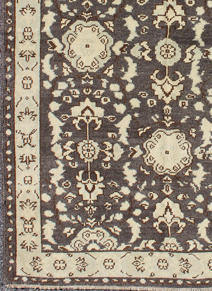 Vintage Turkish Oushak Area Rug in Dark Charcoal, Brown, and Ivory Measures: 3'9 x 5'10 This vintage Oushak was hand - knotted in Turkey during the 1940's. The dark brown field displays clover motifs and other nature designs in antique white ... - Keivan Woven ArtsTU - ALK - 3567 - 6805Rug