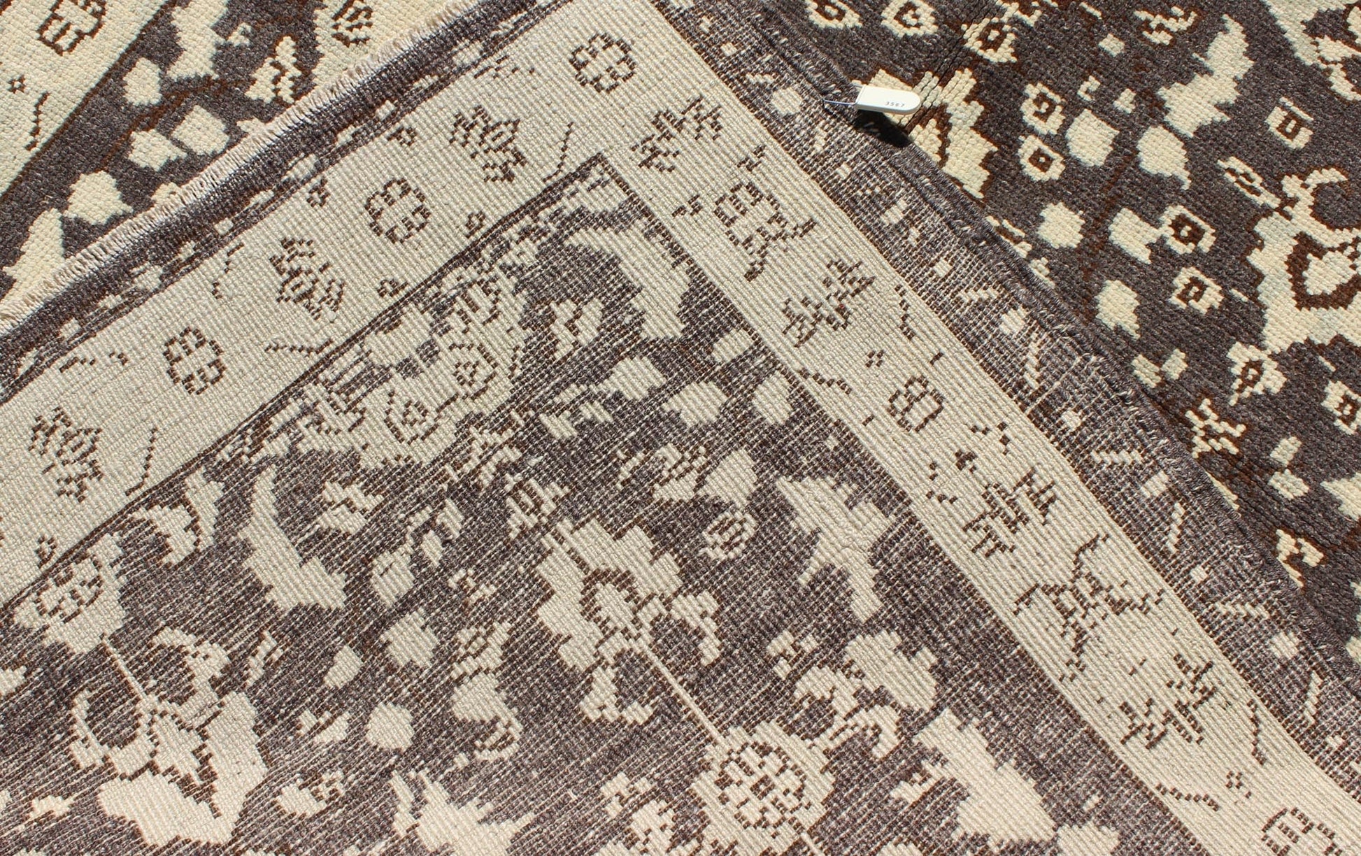 Vintage Turkish Oushak Area Rug in Dark Charcoal, Brown, and Ivory Measures: 3'9 x 5'10 This vintage Oushak was hand - knotted in Turkey during the 1940's. The dark brown field displays clover motifs and other nature designs in antique white ... - Keivan Woven ArtsTU - ALK - 3567 - 6805Rug