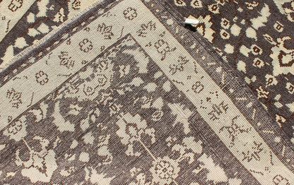 Vintage Turkish Oushak Area Rug in Dark Charcoal, Brown, and Ivory Measures: 3'9 x 5'10 This vintage Oushak was hand - knotted in Turkey during the 1940's. The dark brown field displays clover motifs and other nature designs in antique white ... - Keivan Woven ArtsTU - ALK - 3567 - 6805Rug