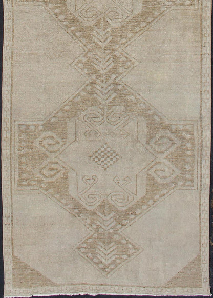Vintage Turkish Oushak Runner With Medallions in Taupe, Tan, and Browns Vintage Medallion Turkish Oushak runner in tan with brown and taupe. Keivan Woven Arts / rug TU - ALK - 3576, country of origin / type: Turkey / Oushak, circa 1940 This u... - Keivan Woven ArtsTU - ALK - 3576 - 12078Rug