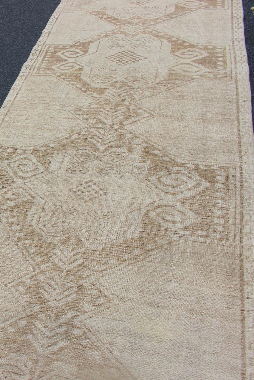 Vintage Turkish Oushak Runner With Medallions in Taupe, Tan, and Browns Vintage Medallion Turkish Oushak runner in tan with brown and taupe. Keivan Woven Arts / rug TU - ALK - 3576, country of origin / type: Turkey / Oushak, circa 1940 This u... - Keivan Woven ArtsTU - ALK - 3576 - 12078Rug