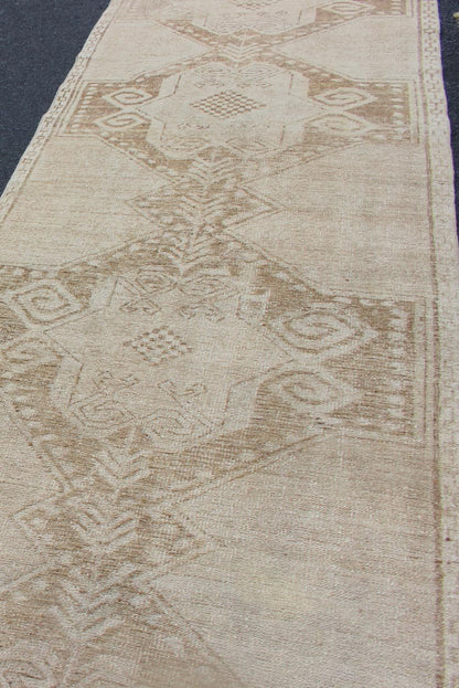 Vintage Turkish Oushak Runner With Medallions in Taupe, Tan, and Browns Vintage Medallion Turkish Oushak runner in tan with brown and taupe. Keivan Woven Arts / rug TU - ALK - 3576, country of origin / type: Turkey / Oushak, circa 1940 This u... - Keivan Woven ArtsTU - ALK - 3576 - 12078Rug