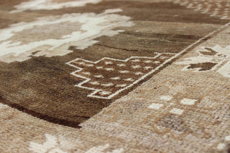 Large Gallery Oushak Rug with Geometric Design and Florals This gallery rug displays 12 medallions that take center stage on a mocha and chocolate brown field. The border reveals tribal inspiration in soft shades of taupe, ivory and chocolate br... - Keivan Woven ArtsTU - ALK - 3579 - 6810Rug