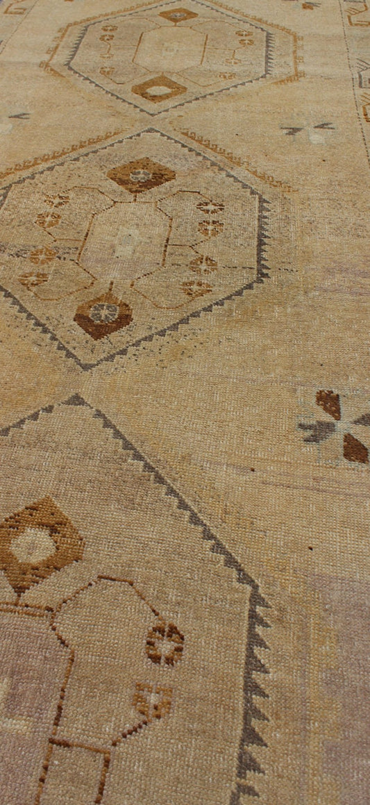 Vintage Turkish Oushak Runner with Tribal Medallions in Lavender, Taupe & Brown This vintage Turkish Oushak gallery rug (circa mid - 20th century) features a unique blend of colors and an intricately beautiful design. The central medallions consis... - Keivan Woven ArtsTU - ALK - 3581 - 6779Rug