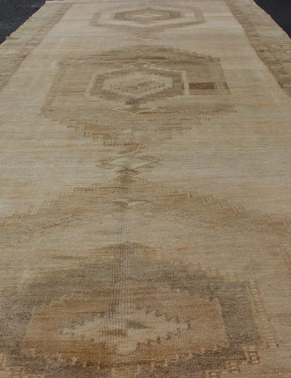Large Gallery Runner Turkish Rug in Earth Tones & Light Brown in Medallions. Vintage wide Gallery runner from Turkey with Geometric Medallion design in various tones earth colors such as of tan, sand, taupe and light brown rug TU - ALK - 3587, country o... - Keivan Woven ArtsTU - ALK - 3587 - 12309Rug