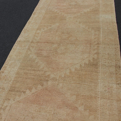 Vintage Turkish Oushak Runner Neutral Colors with Tribal Design in Earth Colors. wide and long vintage Turkish Oushak runner in neutral colors with medallions in taupe, tan, and light brown. rug/TU - ALK - 3590. Vintage Oushak runner Thi... - Keivan Woven ArtsTU - ALK - 3590 - 12108Rug