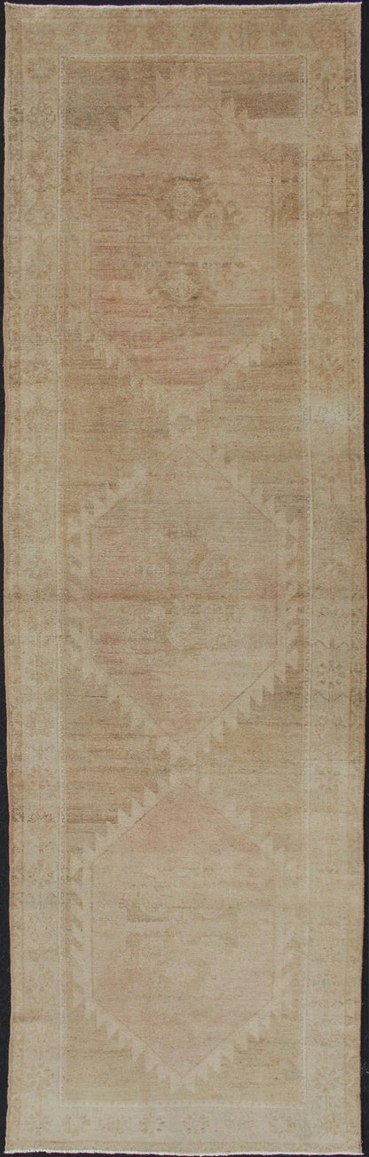 Vintage Turkish Oushak Runner Neutral Colors with Tribal Design in Earth Colors. wide and long vintage Turkish Oushak runner in neutral colors with medallions in taupe, tan, and light brown. rug/TU - ALK - 3590. Vintage Oushak runner Thi... - Keivan Woven ArtsTU - ALK - 3590 - 12108Rug