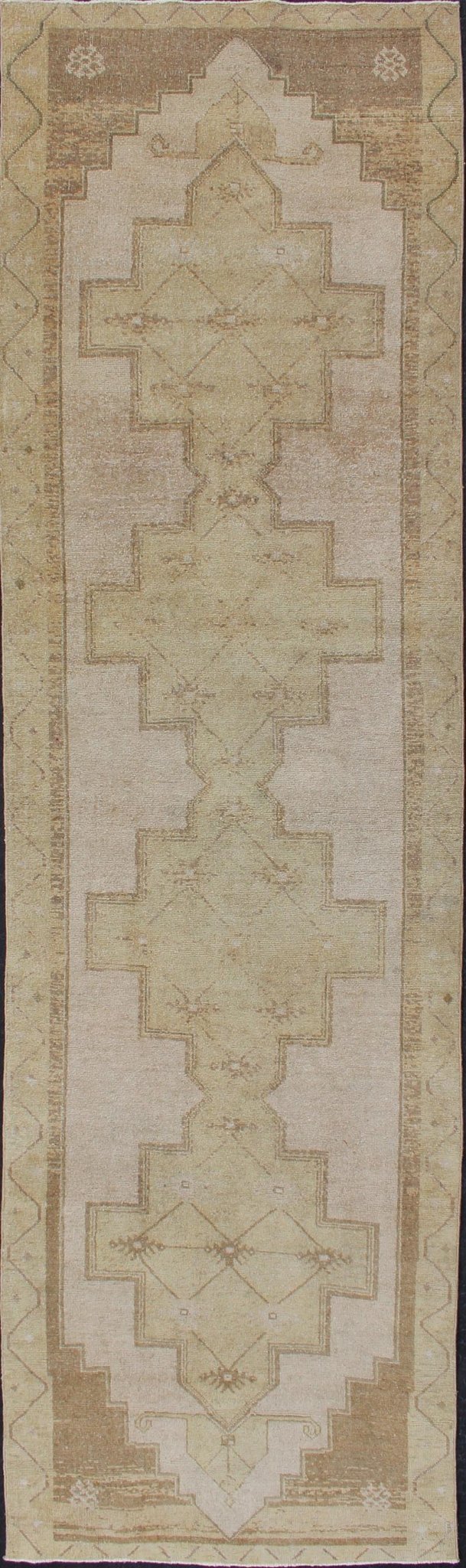 Geometric Design Vintage Turkish Oushak Runner in Lt. Green, Cream and Lt. Brown. Lightly toned vintage Turkish Runner with Geometric Oushak design, rug TU - ALK - 3594, country of origin / type: Turkey / Oushak, circa 1940. This vintage Turkish... - Keivan Woven ArtsTU - ALK - 3594 - 12112Rug