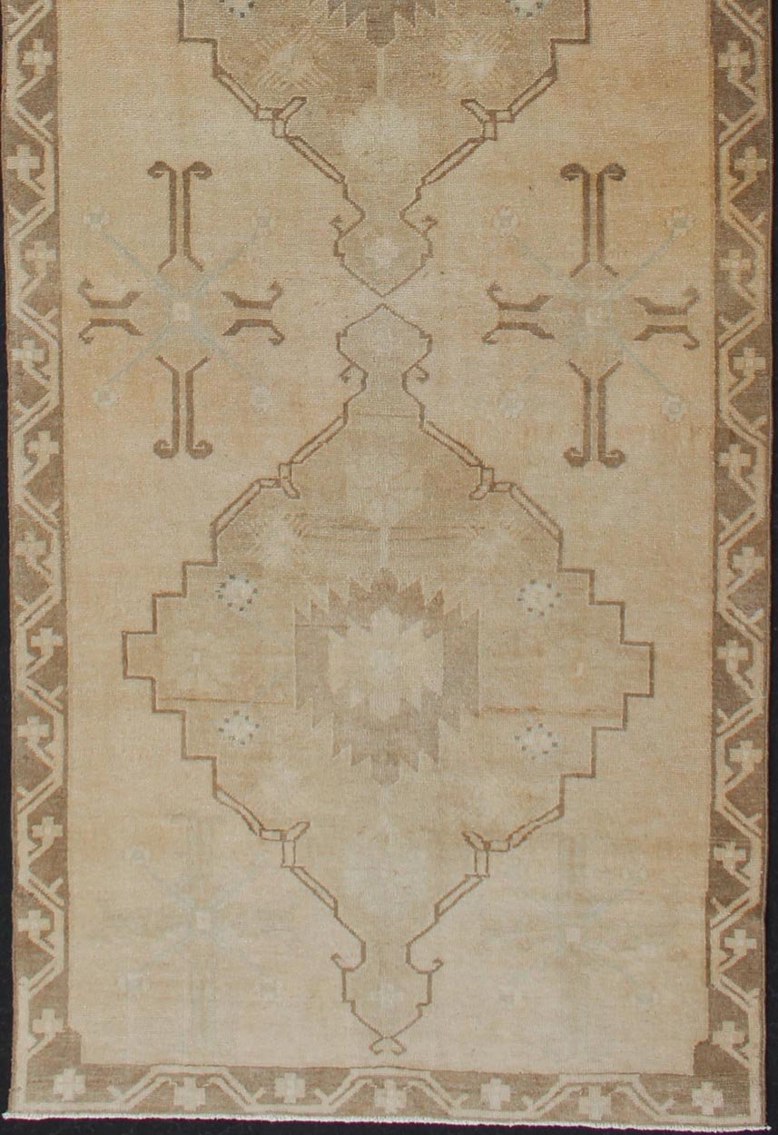 Vintage Turkish Oushak Runner Neutral and warm Colors with Tribal Medallions. wide and long vintage Turkish Oushak runner in neutral colors with medallions in taupe, blue and light brown. rug/TU - ALK - 4873. Vintage Oushak runner This vintage Ousha... - Keivan Woven ArtsTU - ALK - 4873 - 12126Rug