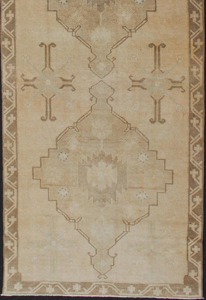 Vintage Turkish Oushak Runner Neutral and warm Colors with Tribal Medallions. wide and long vintage Turkish Oushak runner in neutral colors with medallions in taupe, blue and light brown. rug/TU - ALK - 4873. Vintage Oushak runner This vintage Ousha... - Keivan Woven ArtsTU - ALK - 4873 - 12126Rug