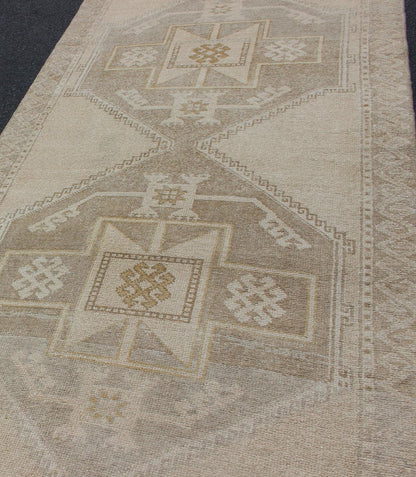Vintage Turkish Hand Knotted Oushak Runner With Etched Medallion Design in Soft Muted Tones Stylized medallion Oushak carpet, rug tu - alk - 4885, Keivan Woven Arts / country of origin / type: Turkey / Oushak, circa 1940 This Oushak carpet fr... - Keivan Woven ArtsTU - ALK - 4874 - 12130Rug