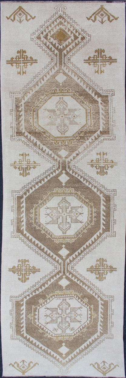 Subdued Vintage Hand Knotted Turkish Oushak Runner With Medallions in Cream and Brown Lightly toned vintage Turkish Runner with Oushak design, Keivan Woven Arts / rug TU - ALK - 4883, country of origin / type: Turkey / Oushak, circa 1940. Thi... - Keivan Woven ArtsTU - ALK - 4883 - 12134Rug