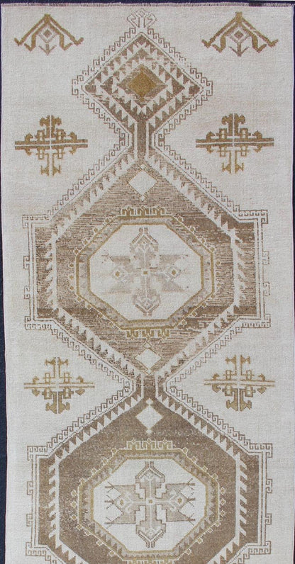 Subdued Vintage Hand Knotted Turkish Oushak Runner With Medallions in Cream and Brown Lightly toned vintage Turkish Runner with Oushak design, Keivan Woven Arts / rug TU - ALK - 4883, country of origin / type: Turkey / Oushak, circa 1940. Thi... - Keivan Woven ArtsTU - ALK - 4883 - 12134Rug