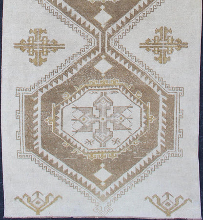 Subdued Vintage Hand Knotted Turkish Oushak Runner With Medallions in Cream and Brown Lightly toned vintage Turkish Runner with Oushak design, Keivan Woven Arts / rug TU - ALK - 4883, country of origin / type: Turkey / Oushak, circa 1940. Thi... - Keivan Woven ArtsTU - ALK - 4883 - 12134Rug
