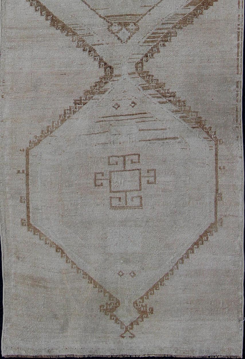 Vintage Turkish Geometric Oushak Runner with Medallions in Taupe and Brown Tri Medallion Oushak runner, rug tu - alk - 4897, country of origin / type: Turkey / Oushak, circa 1940 This Oushak carpet from mid - 20th century Turkey features a st... - Keivan Woven ArtsTU - ALK - 4897 - 10852Rug