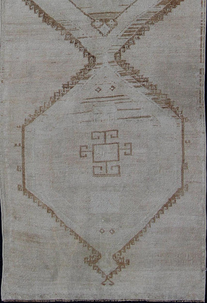 Vintage Turkish Geometric Oushak Runner with Medallions in Taupe and Brown Tri Medallion Oushak runner, rug tu - alk - 4897, country of origin / type: Turkey / Oushak, circa 1940 This Oushak carpet from mid - 20th century Turkey features a st... - Keivan Woven ArtsTU - ALK - 4897 - 10852Rug