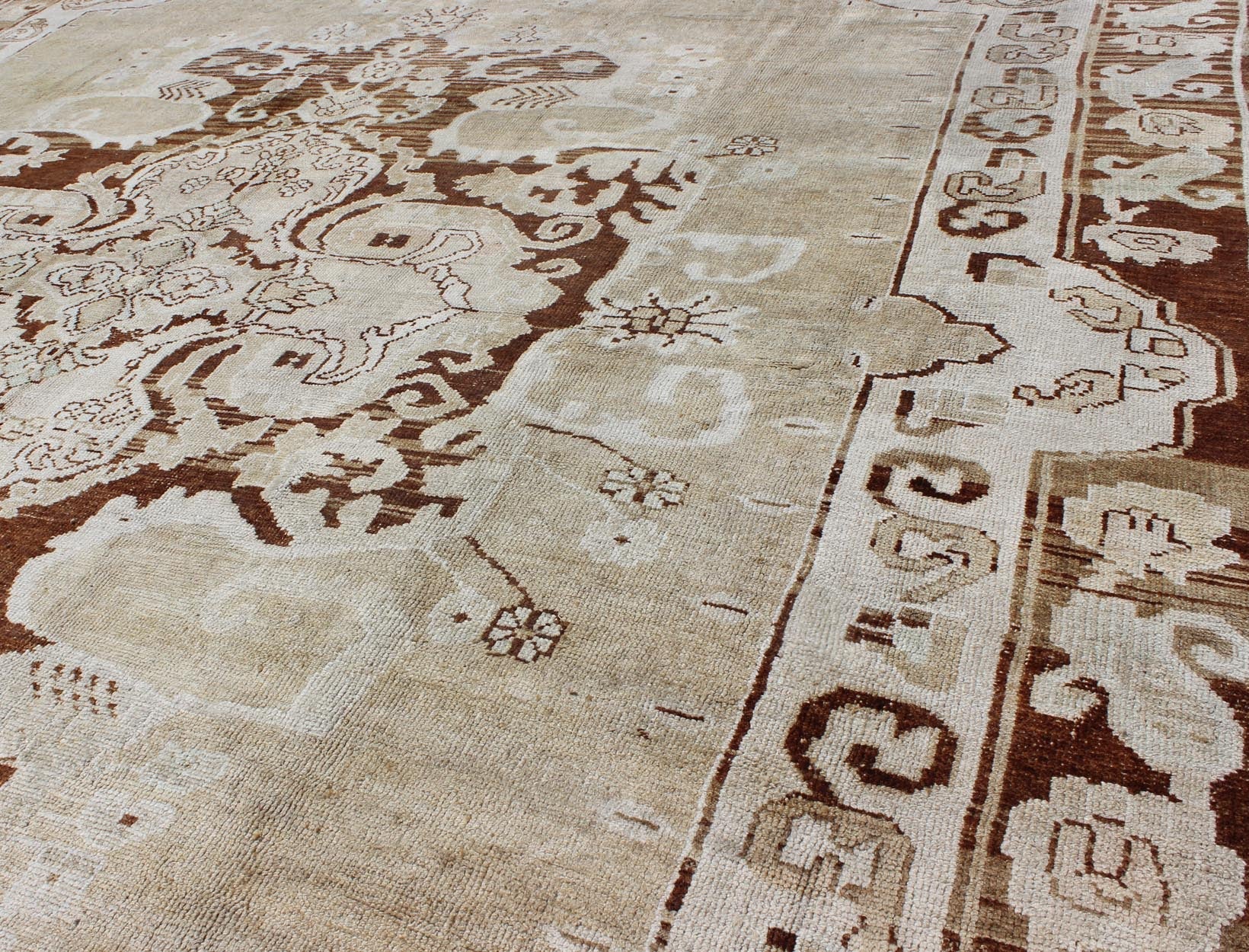 Vintage Turkish Kars Carpet with Floral Medallion in Sienna, Mocha and Bone This incredible vintage Kars carpet beautifully illustrates the imaginative artistry of eastern Turkish weavers. A large and bold sweeping floral medallion takes center ... - Keivan Woven ArtsTU - ARS - 474 - 2460