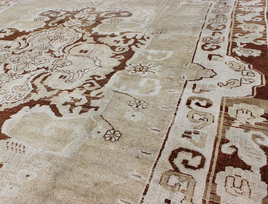 Vintage Turkish Kars Carpet with Floral Medallion in Sienna, Mocha and Bone This incredible vintage Kars carpet beautifully illustrates the imaginative artistry of eastern Turkish weavers. A large and bold sweeping floral medallion takes center ... - Keivan Woven ArtsTU - ARS - 474 - 2460