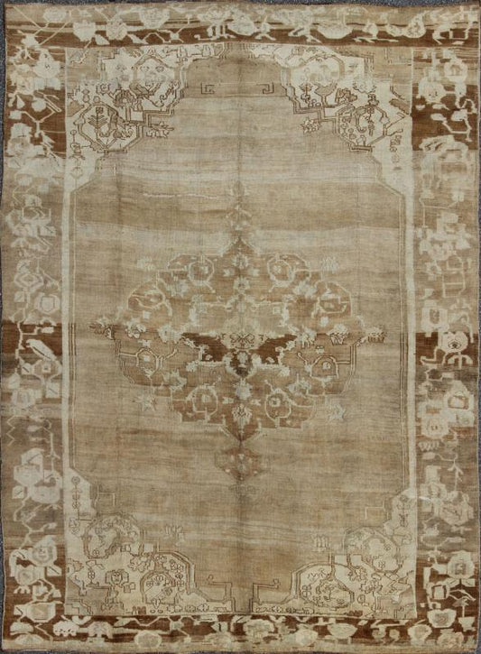 Brown, Tan and Ivory Vintage Turkish Oushak Rug with Floral Center Medallion, rug ars - 538, country of origin / type: Turkey / Oushak, circa mid - 20th century This vintage Turkish Oushak carpet (circa mid - 20th century) features a central, floral m... - Keivan Woven ArtsTU - ARS - 538 - 2444Rug