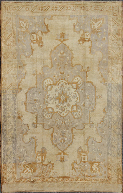 Vintage Turkish Oushak Rug with Medallion Design and Corniced Floral Border Enchanting in both color and design, this vintage Turkish piece was skillfully woven with subtly and beauty in mind. The cream - colored background receives a romantic flo... - Keivan Woven ArtsTU - ARS - 811 - 2434Rug