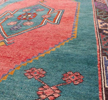 Tribal Design Vintage Turkish Rug in Teal, Blue, Green, Charcoal & Coral. Colorful rug, tribal rug. Colorful Turkish medallion with tribal design in teal, coral, background and complemented by deep multi colors in the repeating geometric motif c... - Keivan Woven ArtsTU - DUR - 136593 - 9532Rug