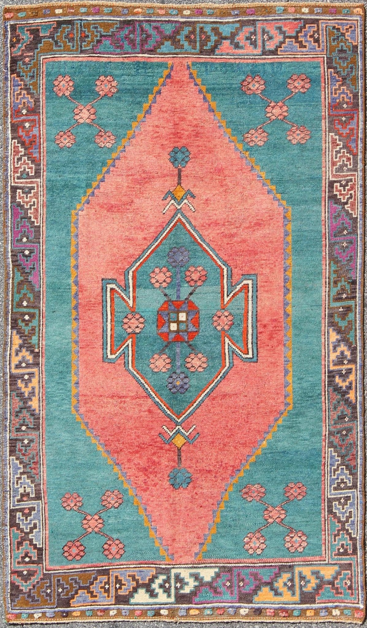 Tribal Design Vintage Turkish Rug in Teal, Blue, Green, Charcoal & Coral. Colorful rug, tribal rug. Colorful Turkish medallion with tribal design in teal, coral, background and complemented by deep multi colors in the repeating geometric motif c... - Keivan Woven ArtsTU - DUR - 136593 - 9532Rug