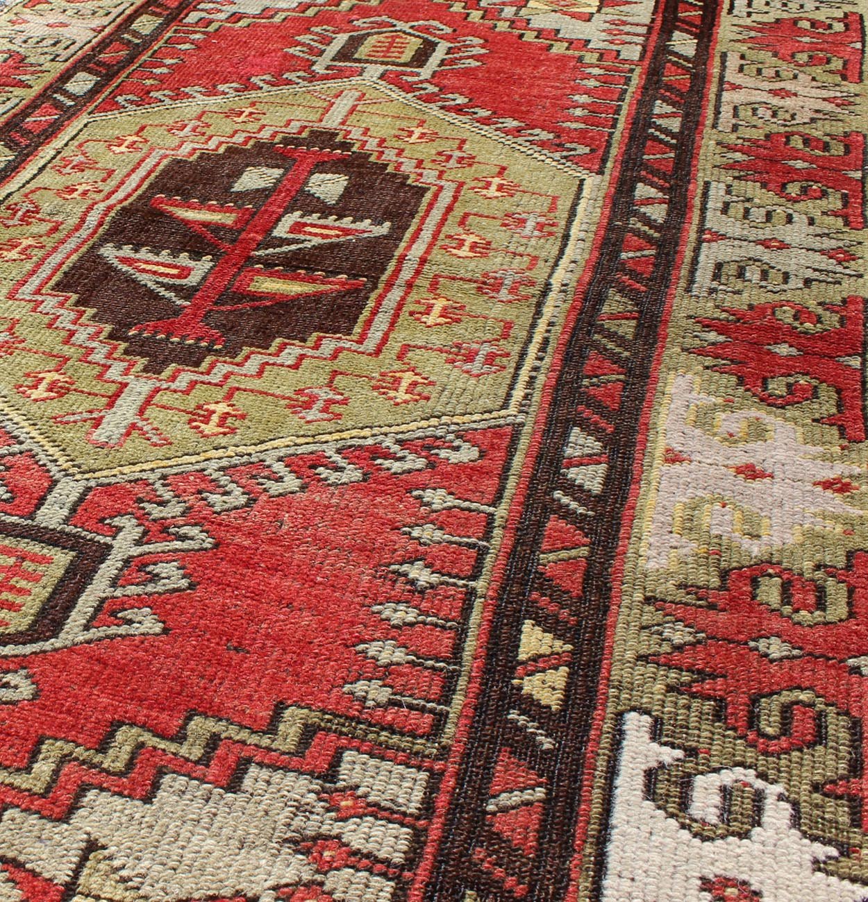 Vintage Turkish Oushak rug with geometric tribal medallion in red and green, Keivan Woven Arts/ rug # TU - DUR - 3458, country of origin / type: Turkey / Oushak, circa mid - 20th century. vintage Oushak rug, vintage rug, vintage Persian rug, antique Oushak. ... - Keivan Woven ArtsTU - DUR - 3458 - 5724Rug