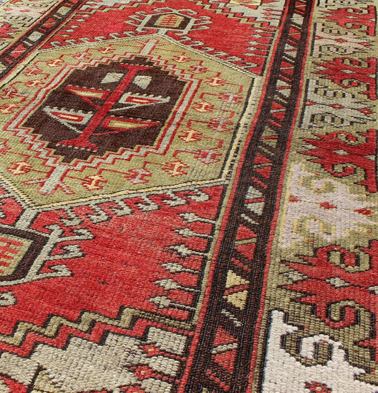 Vintage Turkish Oushak rug with geometric tribal medallion in red and green, Keivan Woven Arts/ rug # TU - DUR - 3458, country of origin / type: Turkey / Oushak, circa mid - 20th century. vintage Oushak rug, vintage rug, vintage Persian rug, antique Oushak. ... - Keivan Woven ArtsTU - DUR - 3458 - 5724Rug