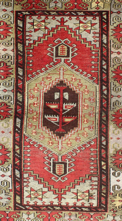 Vintage Turkish Oushak rug with geometric tribal medallion in red and green, Keivan Woven Arts/ rug # TU - DUR - 3458, country of origin / type: Turkey / Oushak, circa mid - 20th century. vintage Oushak rug, vintage rug, vintage Persian rug, antique Oushak. ... - Keivan Woven ArtsTU - DUR - 3458 - 5724Rug