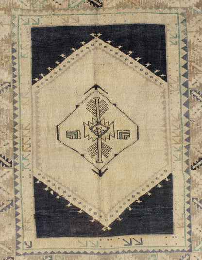 Vintage Turkish Oushak Rug with Central Medallion in Cream and Blue This beautiful rug from mid - 20th century is on a cream ground and home to the center medallion. Three ornate borders with arrows and variegated leaf patterns coordinate wit... - Keivan Woven ArtsTU - DUR - 3691 - 7899Rug