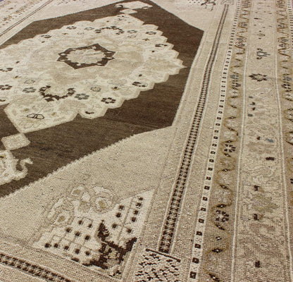 Keivan Woven Arts, Tu - Dur - 445, Vintage Mid - Century Turkish Oushak Rug. This vintage Turkish Oushak carpet (circa mid - 20th century) features a central medallion design, as well as patterns of smaller flowers and floral elements in the four cornices, and... - Keivan Woven ArtsTU - DUR - 445 - 2922Rug