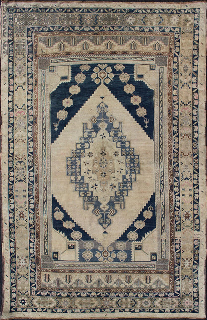 Blue, Brown, and Cream Hand Knotted Turkish Oushak Rug Vintage With Medallion Design Vintage Oushak carpet with medallion design, rug TU - DUR - 4814, country of origin / Keivan Woven Arts type: Turkey / Oushak, circa 1940 This vintage Ousha... - Keivan Woven ArtsTU - DUR - 4814 - 10752Rug